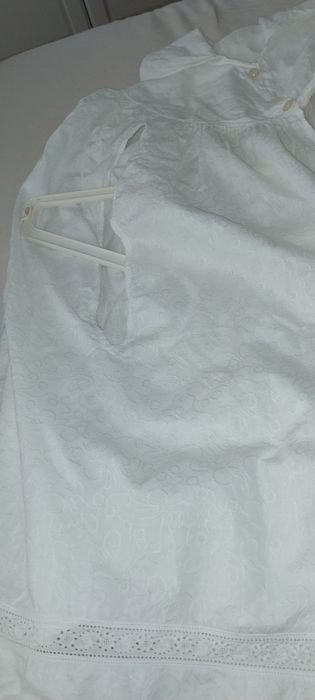 Capa para pentar com mais de 100 anos em tecido bordado