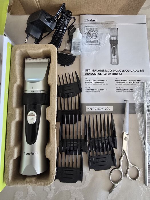 Máquina tosquiadora e corta-unhas