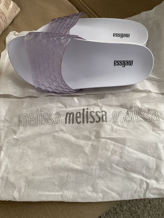 Slide Melissa, usada uma vez!