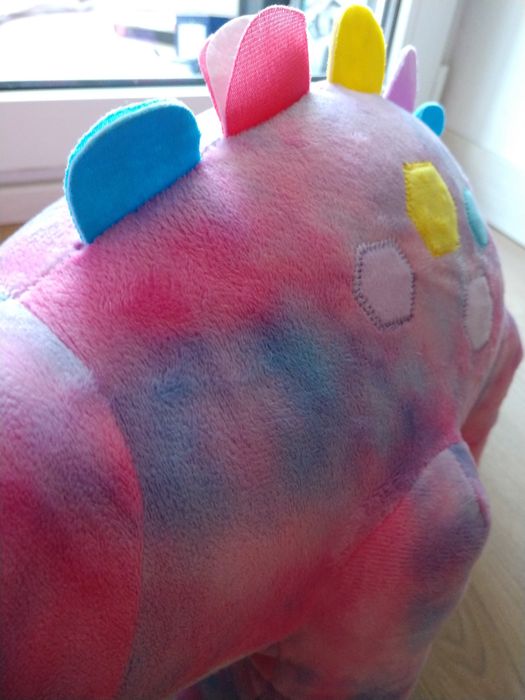 М'яка іграшка динозаврик