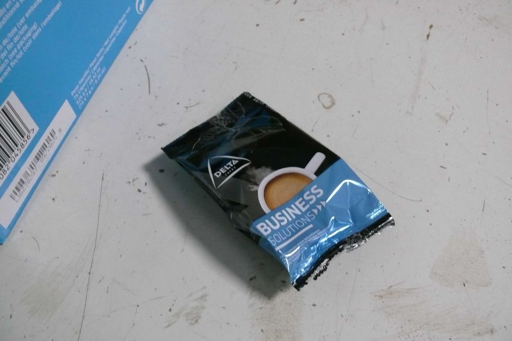 Caixa de cápsulas de café Delta Business Solutions.