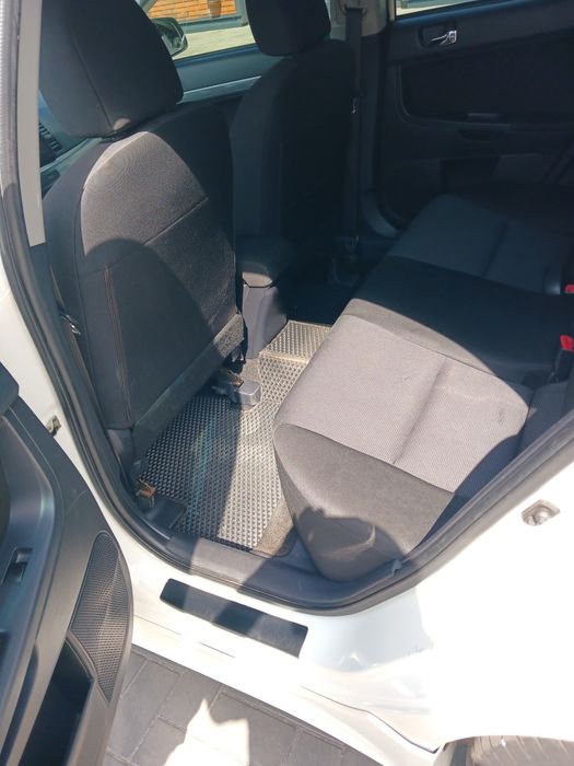 Mitsubishi Lancer 2009 VIN JMBLTCX3A9U002885 фото оголошення 7 з 18