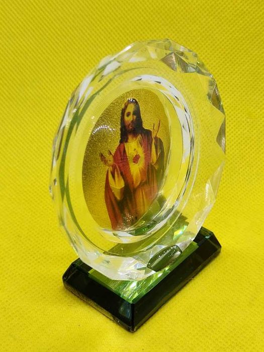 Imagem religiosa formato circular com base de Jesus Cristo