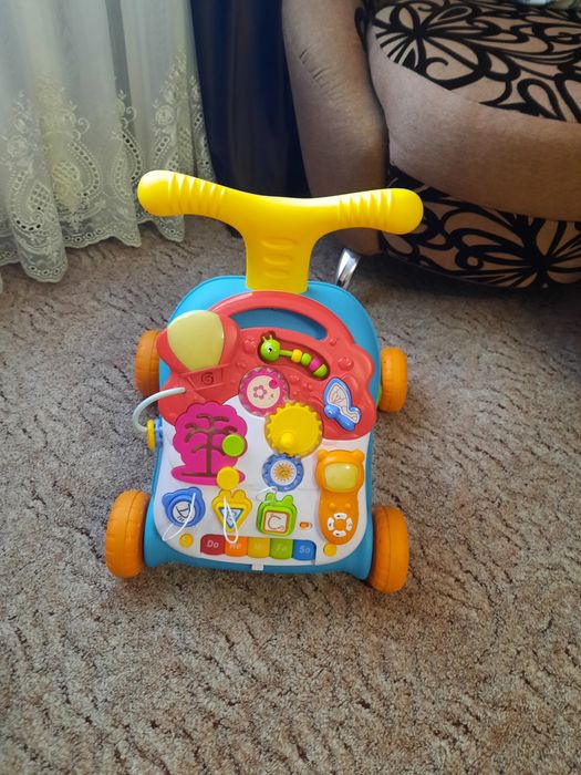 Дитяча каталка-ходунки з ігровою панеллю. Ходунки зі звуковими ефектам