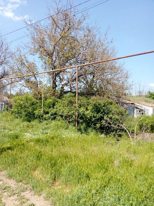 Участок со строениями