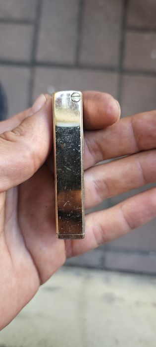 Isqueiro a gás da marca SUNEX.