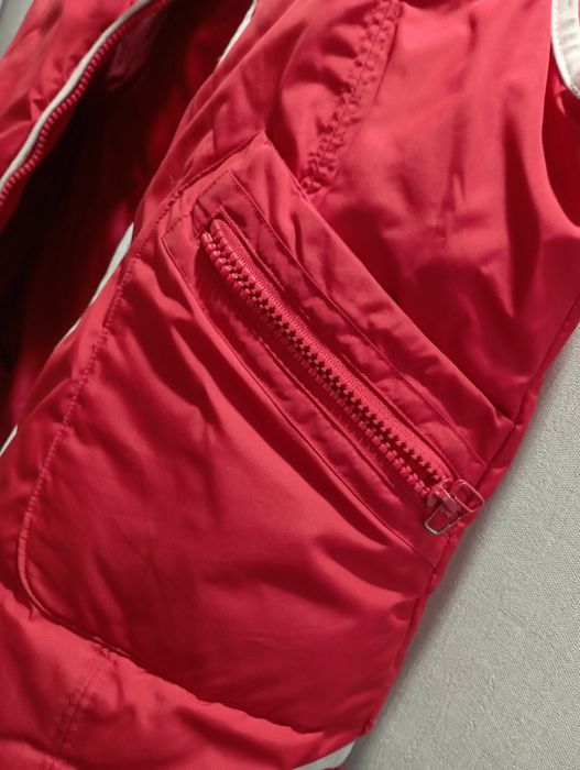 Червона  жилетка