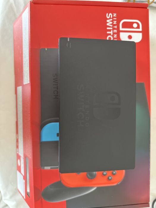 Nintendo Switch + 8 jogos