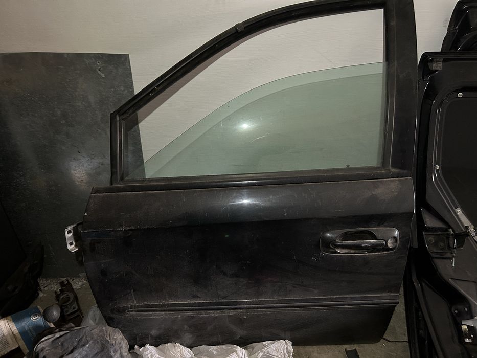 Водительская дверь додж рам -ван,крайслер вояджер в сборе