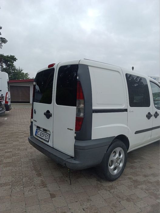 Машина Fiat Doblo