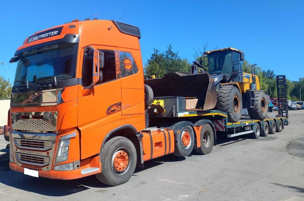 Послуги сідлового тягача Volvo з тралом 58т