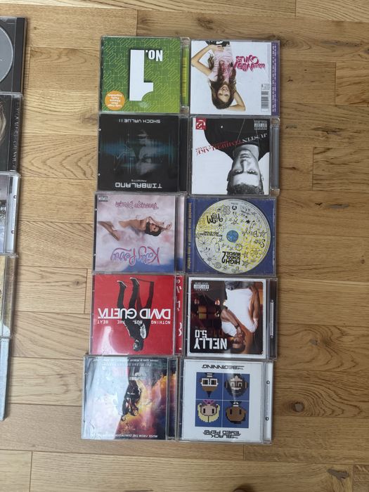10 plyt Cd. High school musical 2, David Guetta. Katy Perry. Timbaland