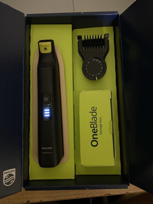 Philips oneblade pro 360 електробритва тример