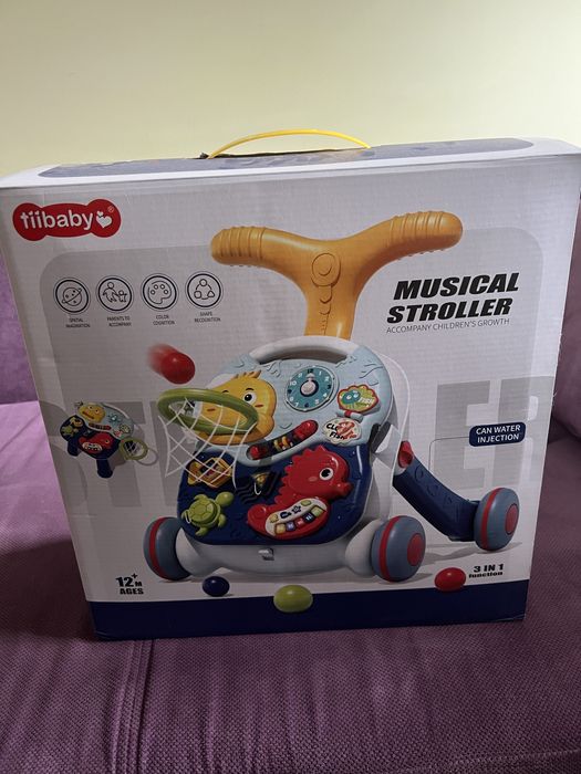 Каталка-ходунки tiibaby musical stroller