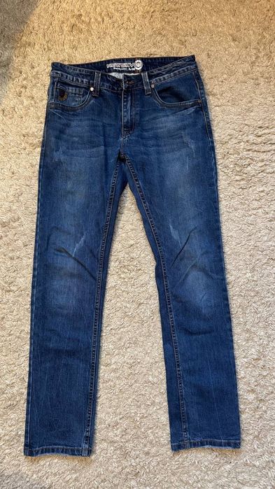 Джинси чоловічі синього кольору.