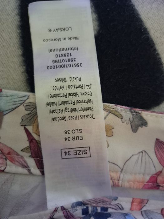 Spodnie damskie w kwiaty rozmiar 34