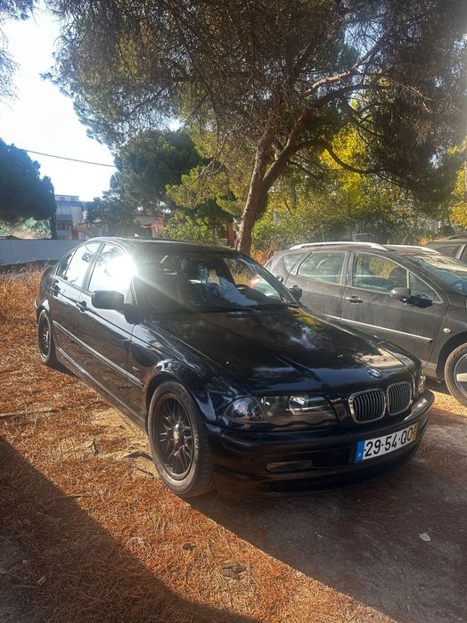 BMW E46 preto sedan