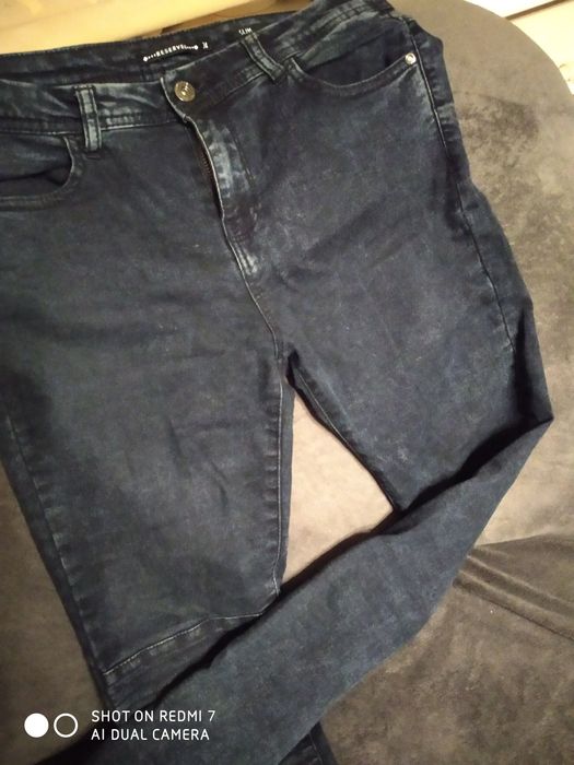 spodnie jeansyReserved 38