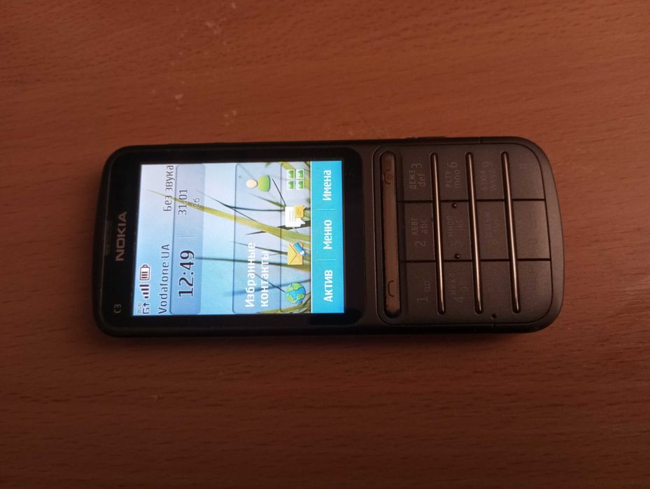 Мобильный телефон Nokia C3-01 сенсорно кнопочный звонилка
