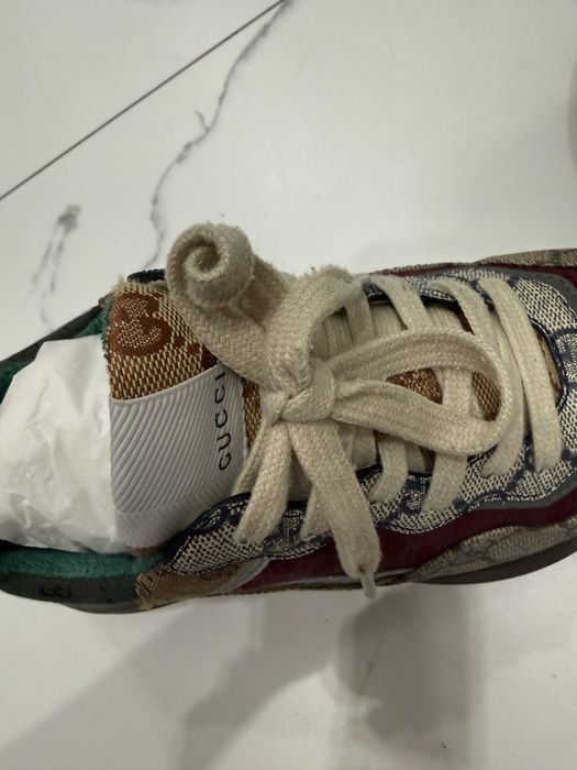 Кроссовки Gucci.