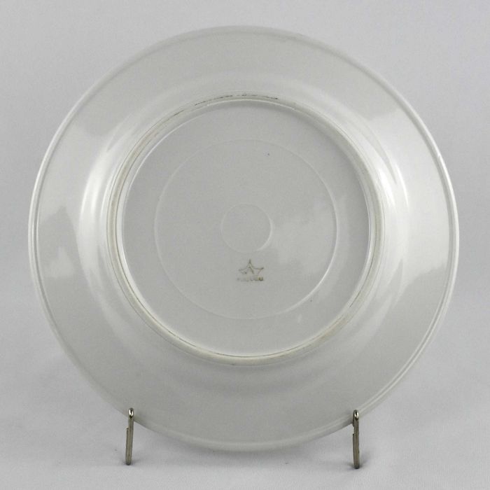 Prato porcelana Artibus com publicidade do hotel “HE”