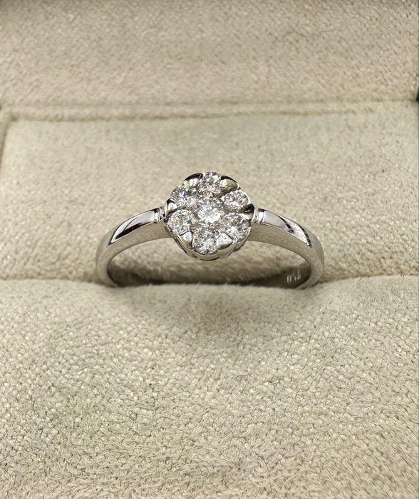 Złoty pierścionek 750 z diamentami 0,22ct Si1-P1/H-I