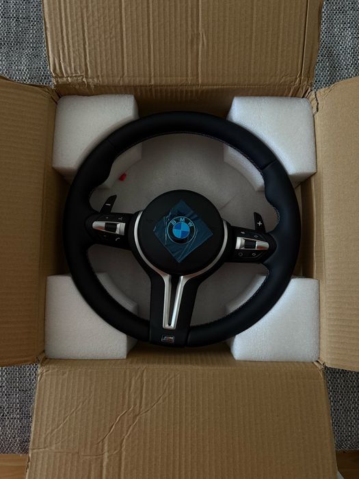 Volante + Airbag + Patilhas BMW E81/E82/E90/E91/X1/E70/E71 (Novo)