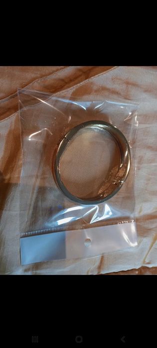 Pulseira dourada com íman - Oriflame