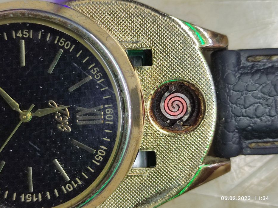 Часы с зажигалкой,зарядкой.