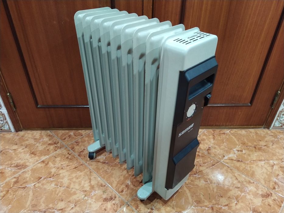 Aquecedor radiador a óleo  casa quarto apartamento vivenda escritório gabinete cozinha.