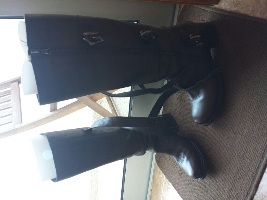 Botas cano alto em pele