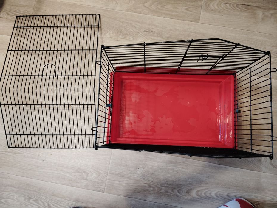 Клітка для домашніх улюбленців