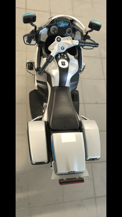 Mota eléctrica Policia de Brincar Estado Nova