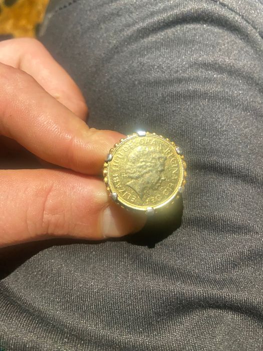 Meia libra prata dourada