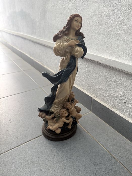 Santa com anjos, antiguidade