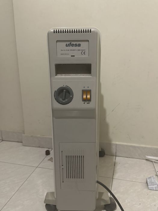Aquecedor a oleo seis barras a funcionar perfeitamente