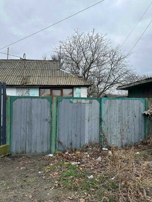 Пів будинку в центрі Баришівки