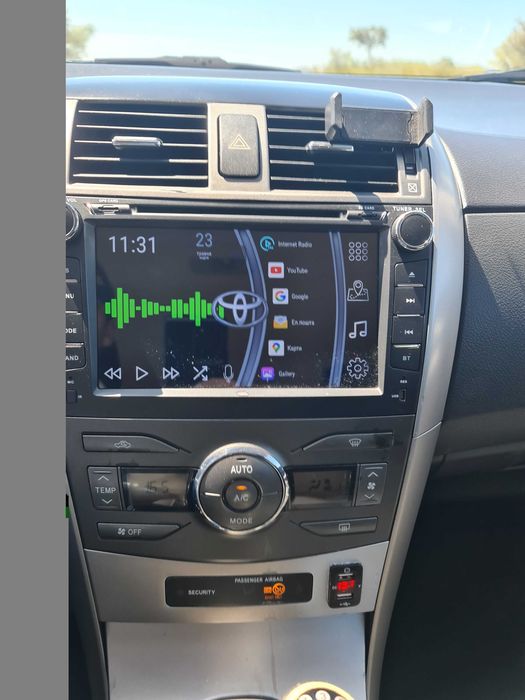 Toyota Corolla e150 — photo 2
