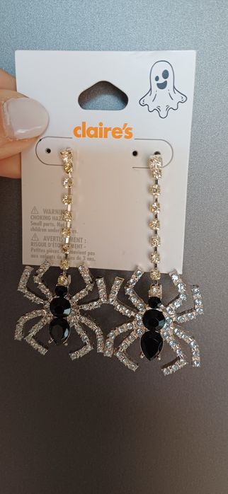 Brincos com pedras e aranha Claire's