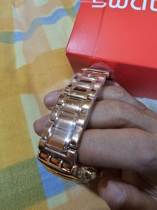 Swatch Irony Chrono dourado. Novo.