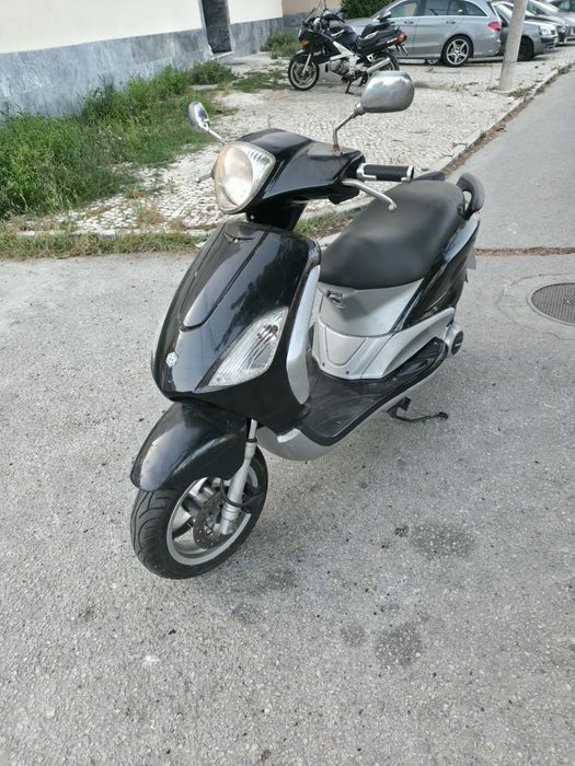Piaggio fly 125 4 tempos muito económica