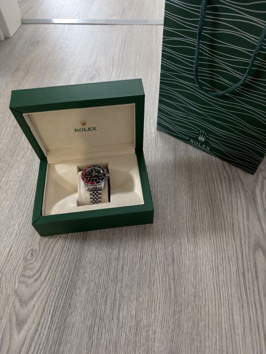 Rolex preto e vermelho