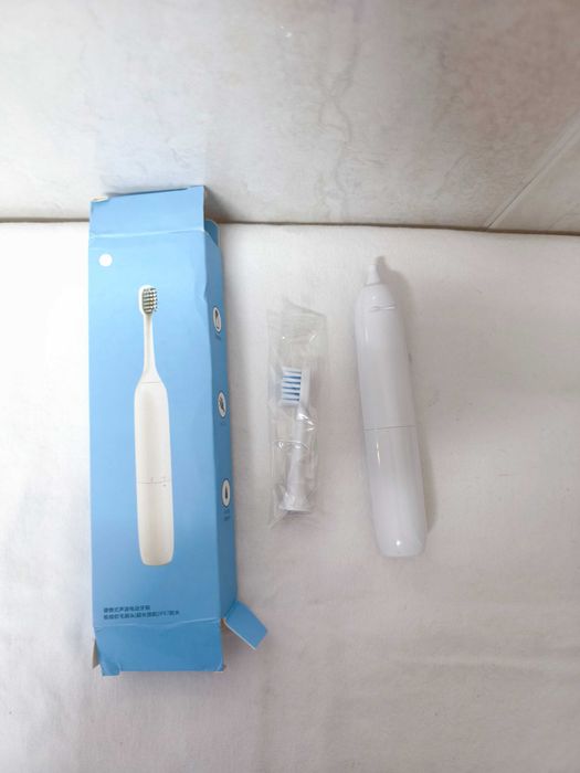 Escova de dentes a pilhas