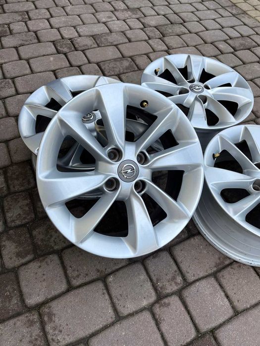 Oryginalne alufelgi Opel 4x100 15 cali Czujniki Corsa Adam Karl