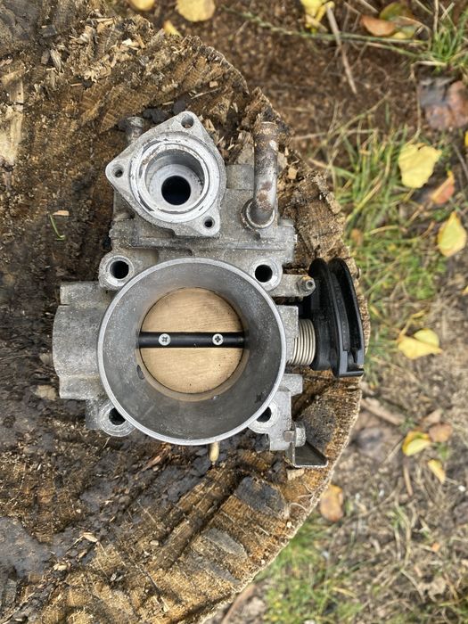 Продам дросельную заслонку лансер 9