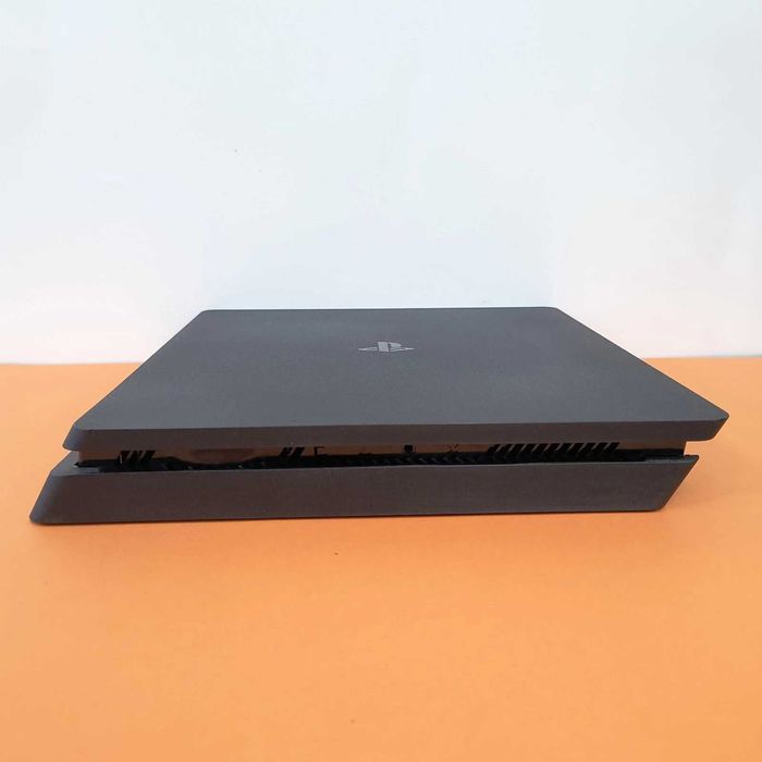 PS4 Slim 1TB Desbloqueada + GTA 5 + 3 Jogos + 1 Comando Novo + Cabo