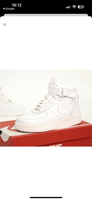 Белые кожаные кроссовки Nike Air Force 1 Mid.
