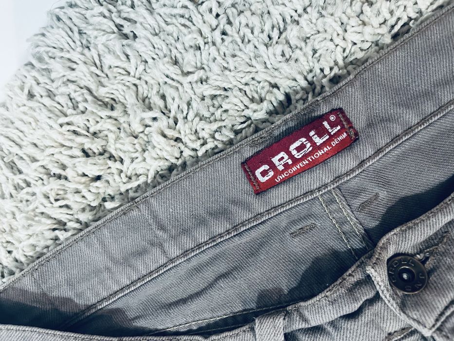 Brazowe meskie jeansy rozm M khaki szerokie