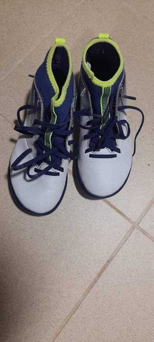 Chuteiras para relva sintética