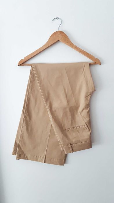 Calças bege clássicas | Mango